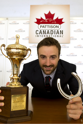 Post Position Draw Master Indy race car driver James Hinchcliffe holds the lucky horse shoe after assisting in making the draw for the $1,000,000 race at Woodbine Racetrack on Sunday. Photo by WEG/Michael Burns
