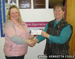 Nancy Kavanagh, Ontario's EFC representative and secretary presents $16,000 cheque to Equine Guelph director, Gayle Ecker. Photo by Henrietta Coole