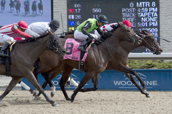 Let It Ride Mom (inside #5) edges out favourite Moonlit Promise (outside #8) in the $125,000 Whimsical Stakes (Grade 3) on Saturday, April 28 at Woodbine Racetrack.
