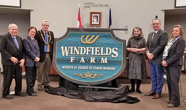 Windfields Farm entry sign (from left): Dr. Gary Polonsky; Sandy Hawley; Oshawa Mayor John Henry; Noreen Taylor, third Chancellor of UOIT; Sue McGovern, Vice-President, External Relations and Advancement; Dr. Steven Murphy, President, UOIT.