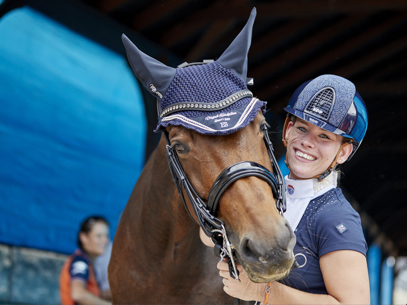 Rixt Van der Horst (NED) with her new horse, Findsley take delight in securing the gold medal in the Adequan© Para Dressage at the FEI World Equestrian Games™ Tryon today, successfully defending her World Championship individual title from Normandy 2014.