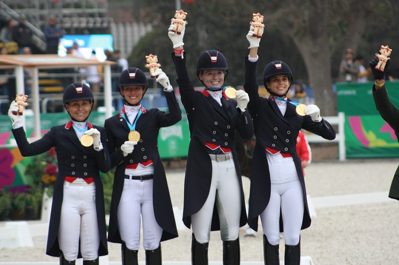 The Canadian team of (l-r) Jill Irving, Tina Irwin, Lindsay Kellock and Naima Moreira Laliberte captured the gold medal at the Pan Am Games in Lima, Peru.