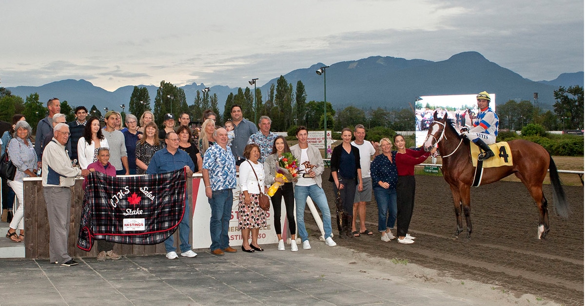 Edmonton Oilers’ Ryan Nugent-Hopkins (holding the trophy) in the winner’s circle after his filly Infinite Patience won the 2019 CTHS Sales Stakes at Hastings Racecourse. (Four Footed Fotos)
