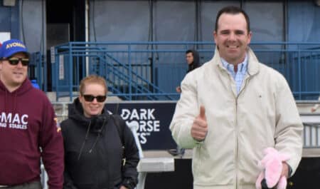 Don MacRae walks out to the winner's circle at Woodbine Racetrack.