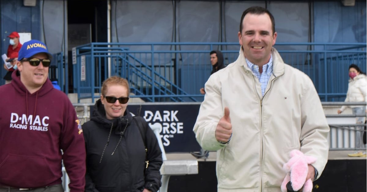 Don MacRae walks out to the winner's circle at Woodbine Racetrack.