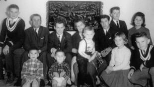 A black-and-white old photo of the Turcotte family.