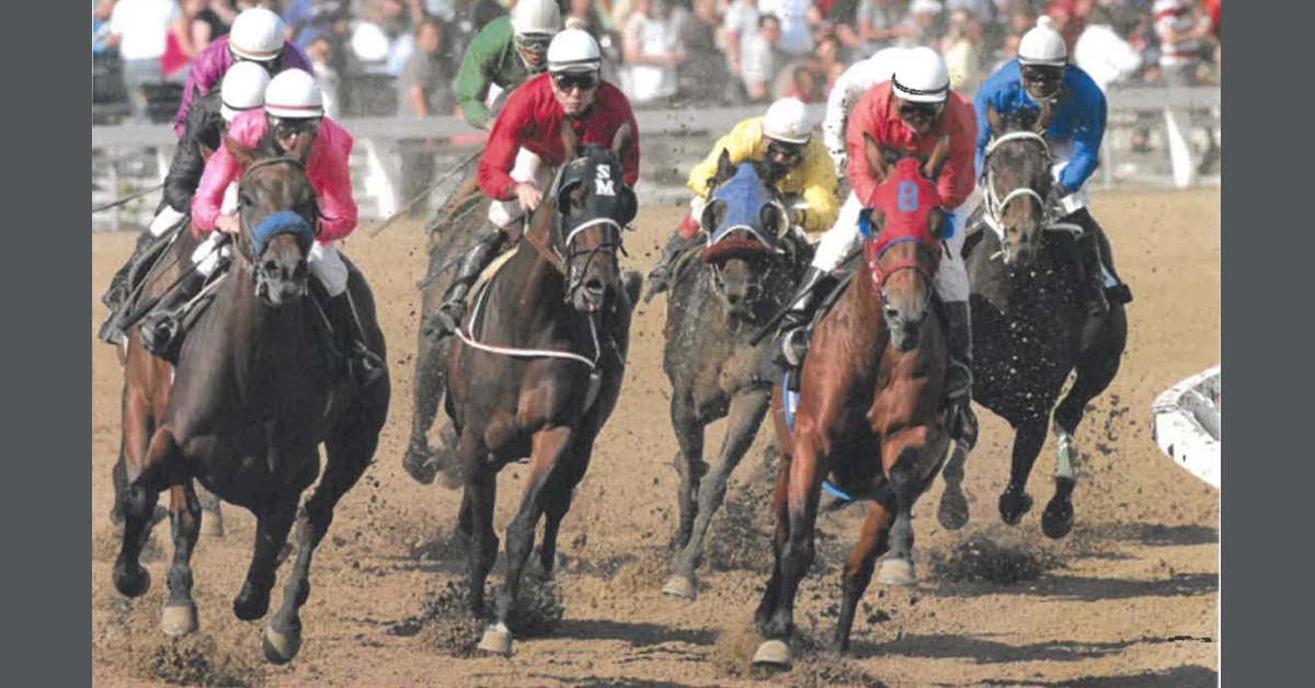 Horses racing at Assiniboia Downs.