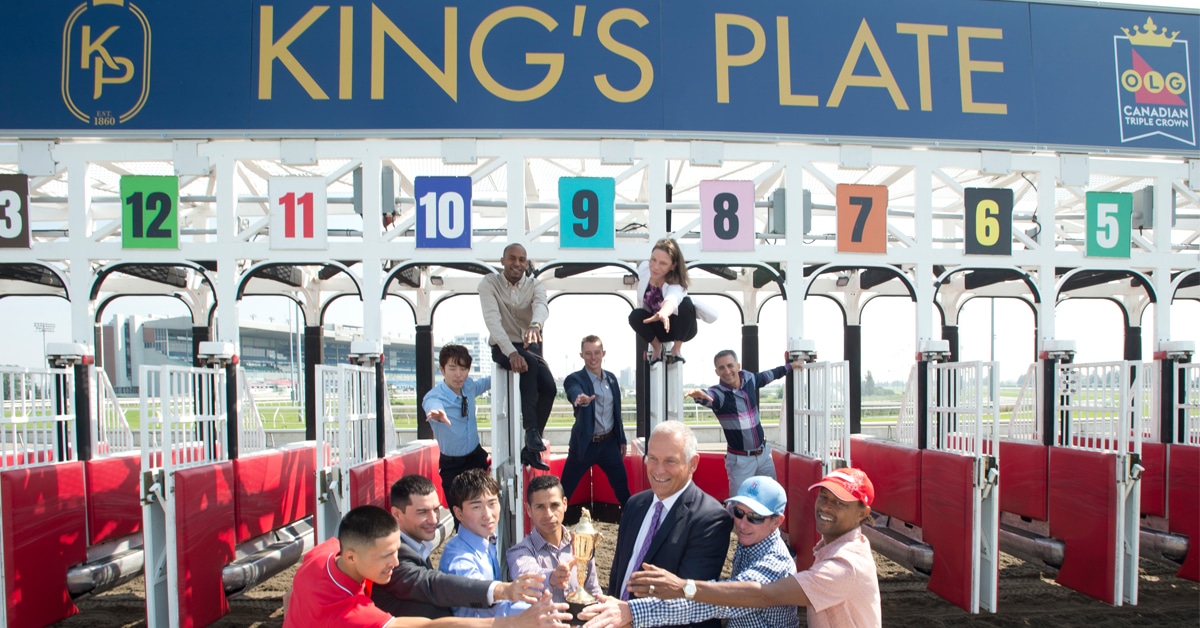 A group of people in a starting gate.