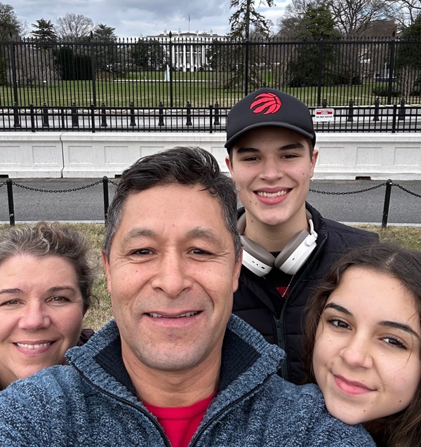 A family selfie in front of the White House.