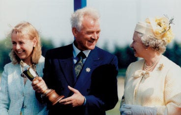 Frieda and Frank Stronach with The Queen at the races.