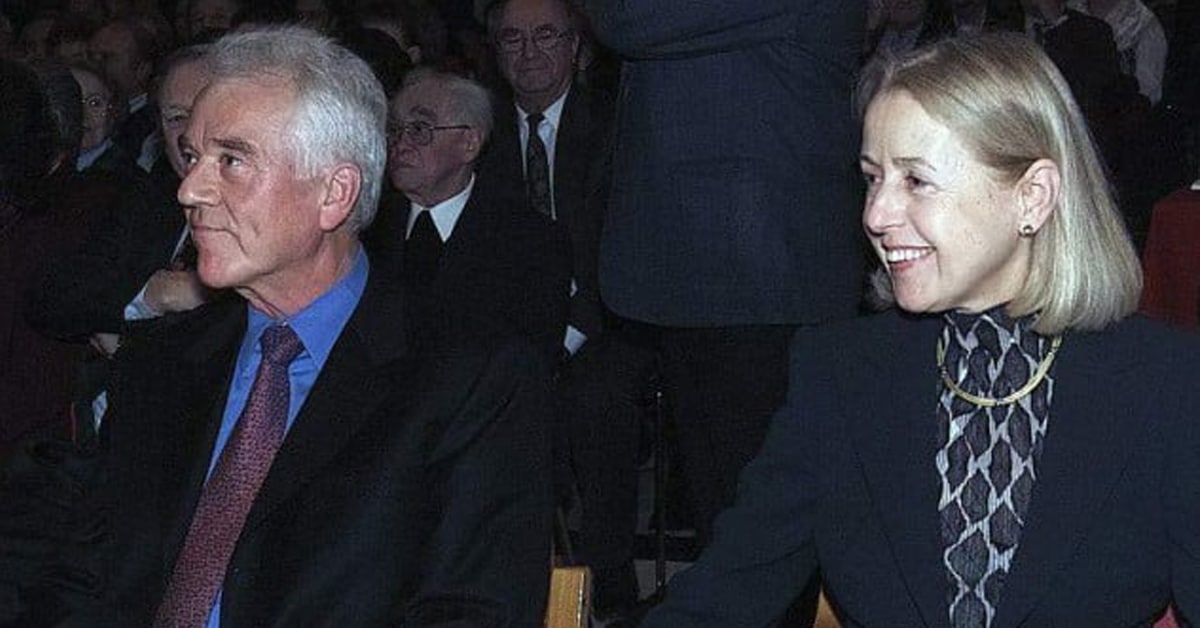 Frank and Frieda Stronach sitting in an audience.